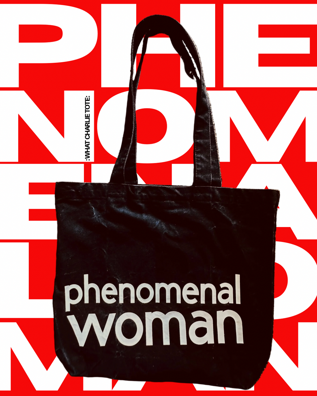 the What Charlie TOTE PHENOMENAL WOMAN Canvas tote bag on graphic lettering background 