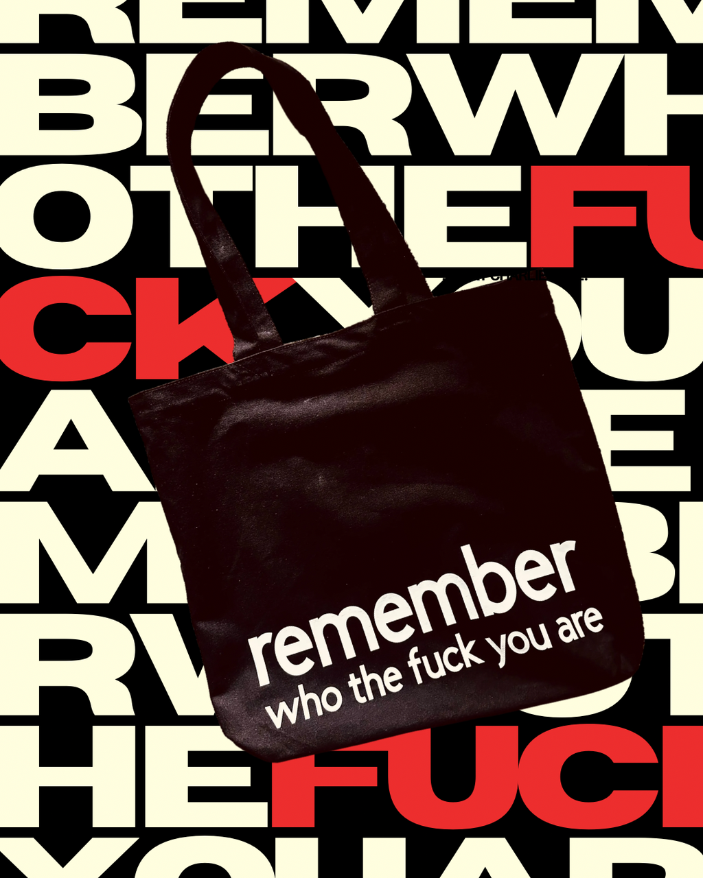 the What Charlie TOTE REMEMBER WHO THE FUCK YOU ARE Canvas tote bag on graphic typeface background 