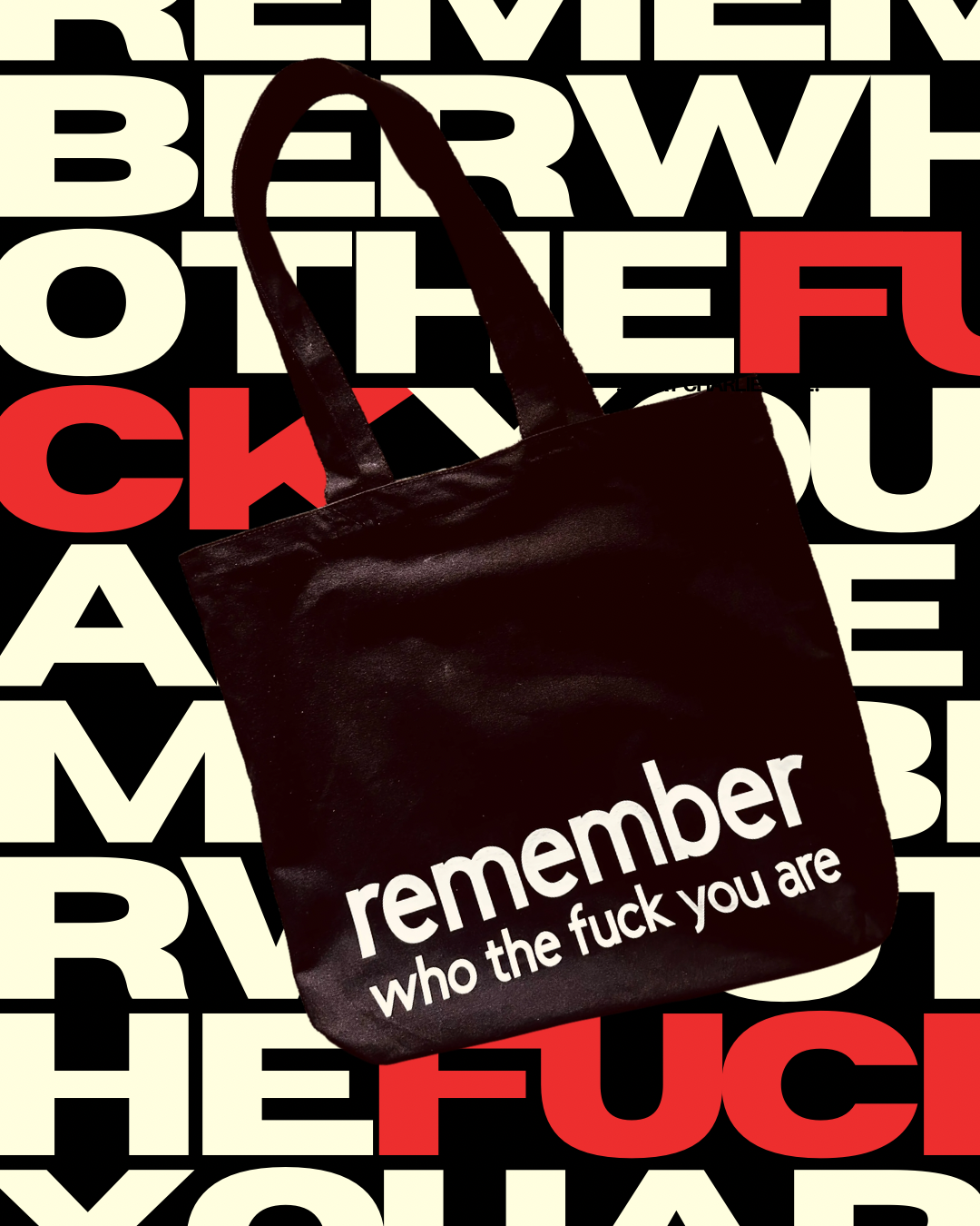 the What Charlie TOTE REMEMBER WHO THE FUCK YOU ARE Canvas tote bag on graphic typeface background 
