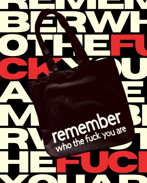 the What Charlie TOTE REMEMBER WHO THE FUCK YOU ARE Canvas tote bag on graphic typeface background 