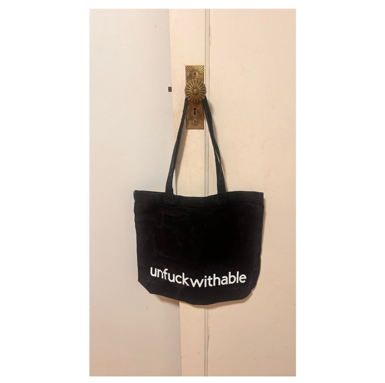 the UNFUCKWITHABLE premium cotton canvas tote bag